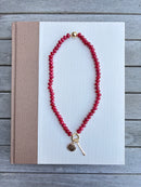 Red Beaded Charm Necklace with Gold Charms