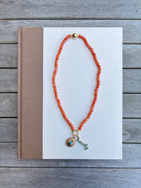Orange Beaded Necklace with Turquoise Charms