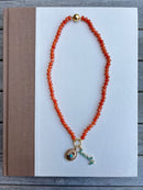 Orange Beaded Necklace with Turquoise Charms