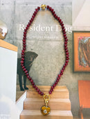 Burgundy Beads with Tortoise Heart Charm